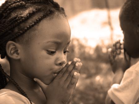 little girl praying